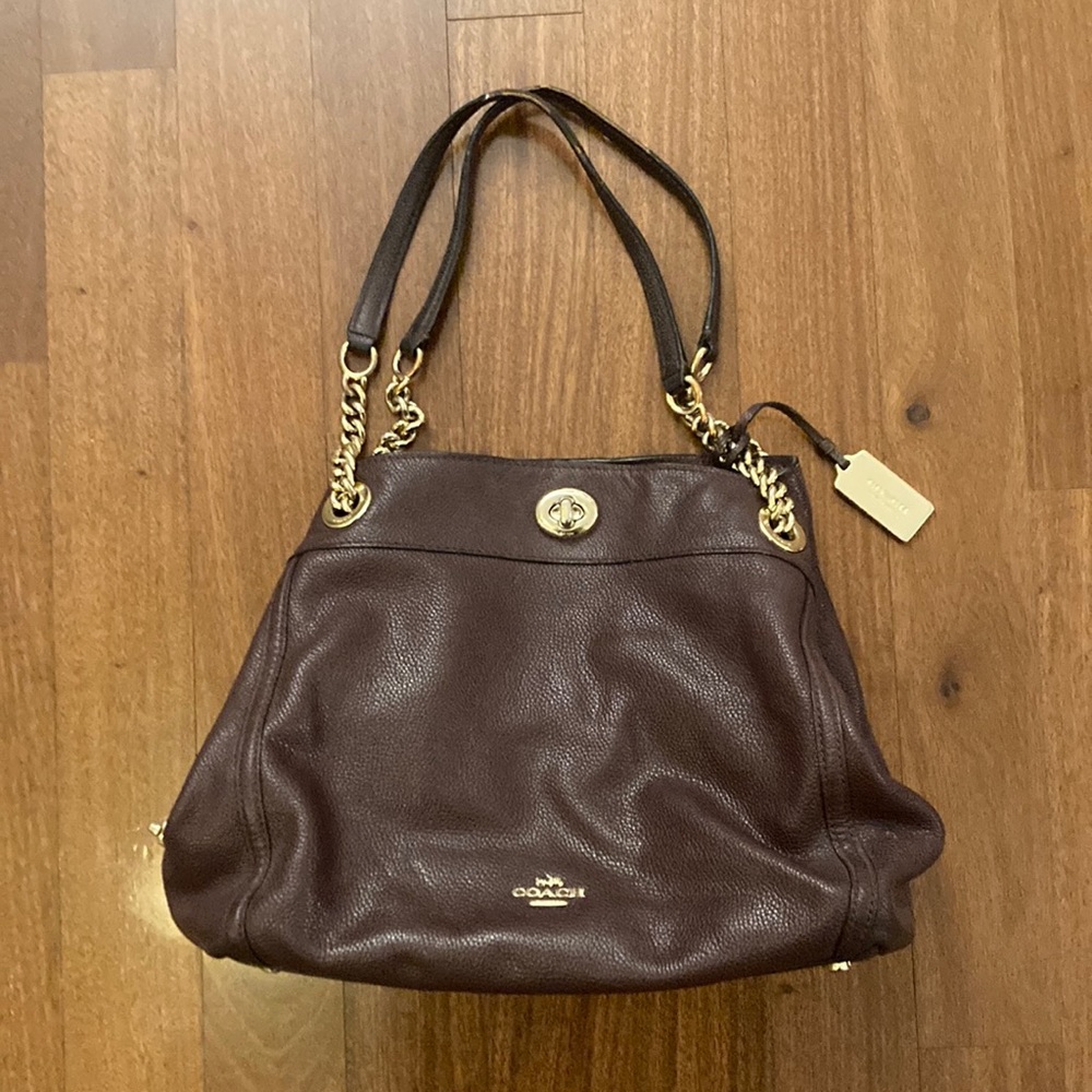 Coach purse, used in good condition, maroon color